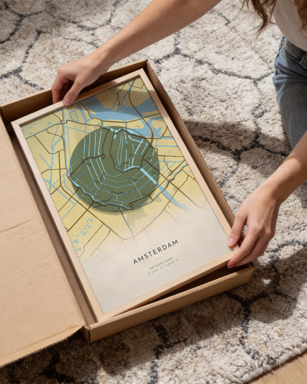 Amsterdam 3D relief map in Vale, framed in a room
