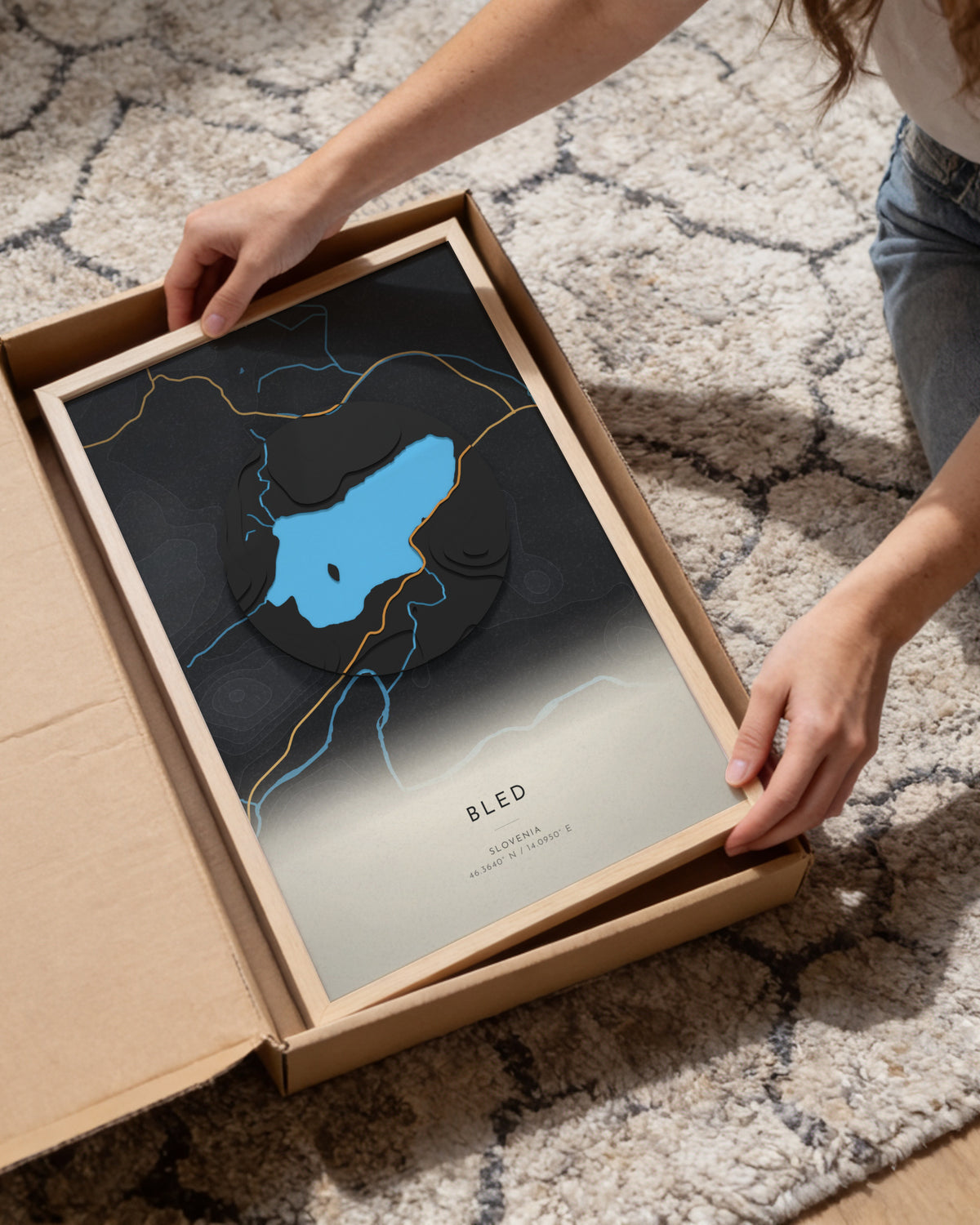 Bled 3D relief map in Basalt, framed in a room